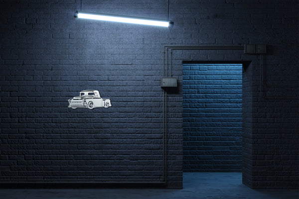 Awesome 50s era GMC Chevrolet Chevy pickup truck 3100 wall art shown on dark brickwork wall